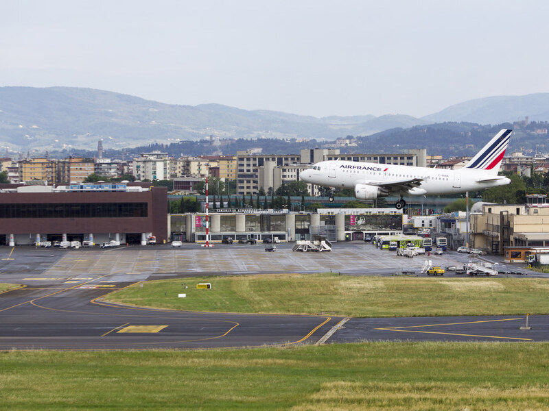 Luxury airport transfer service in Florence with professional chauffeur and premium vehicle