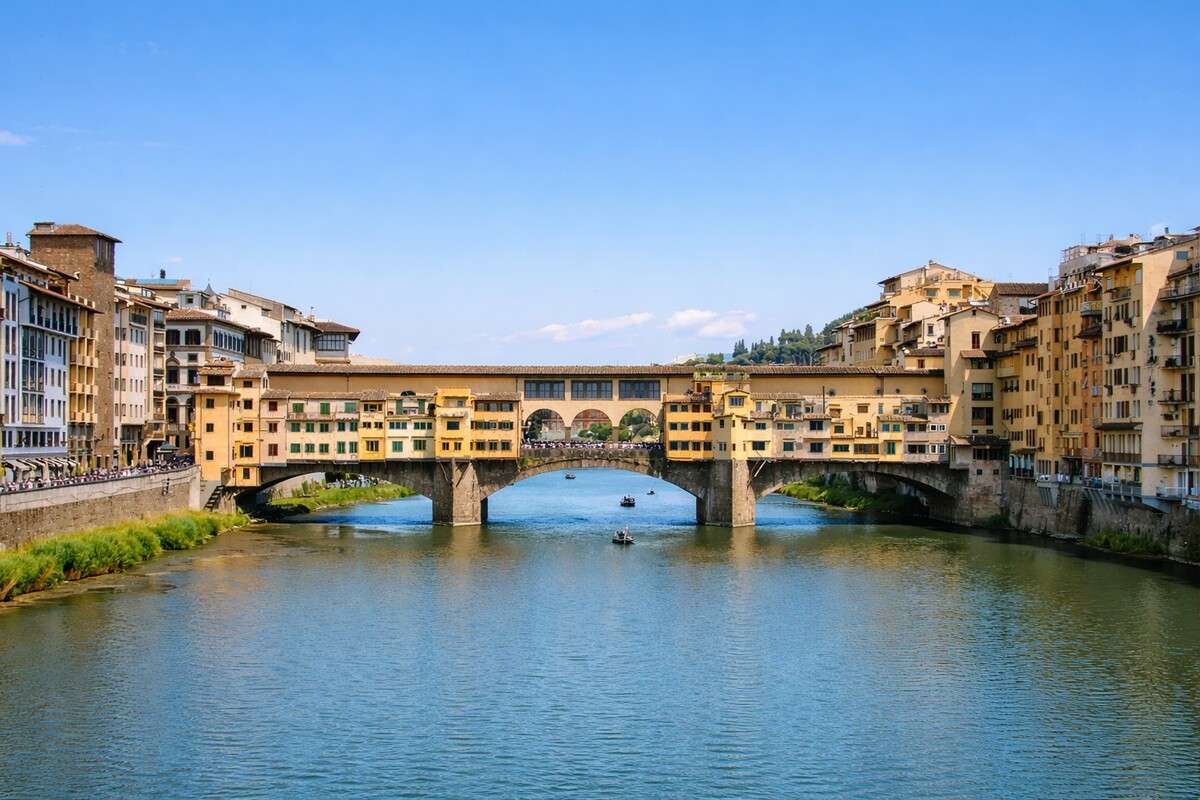 Ponte Vecchio viewed from the Arno River with luxury private chauffeur service in Florence for cruise passengers