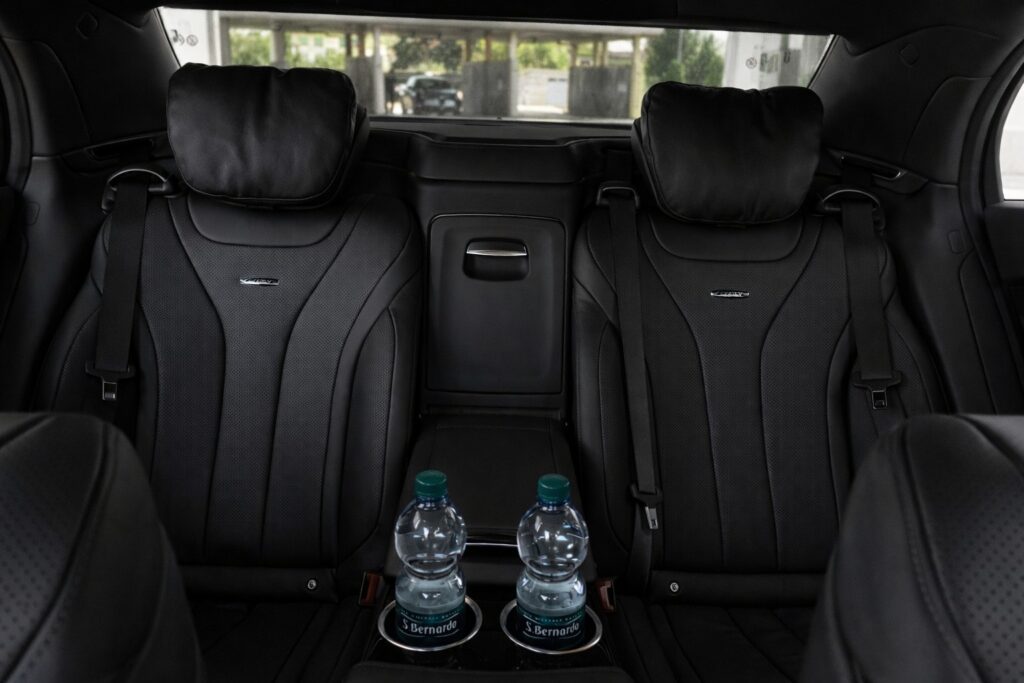 Mercedes E-Class business class interior with premium leather rear seats — private transfer Tuscany