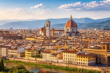 Florence skyline with Duomo and Arno River under clear blue sky, destination for private transfer from Rome Fiumicino Airport