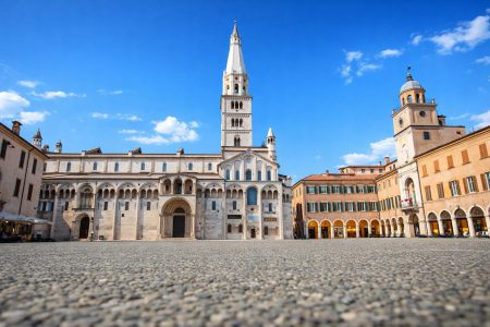 Private chauffeur transfer from Florence to Modena – Modena Cathedral and Torre Ghirlandina on a sunny day in Emilia-Romagna